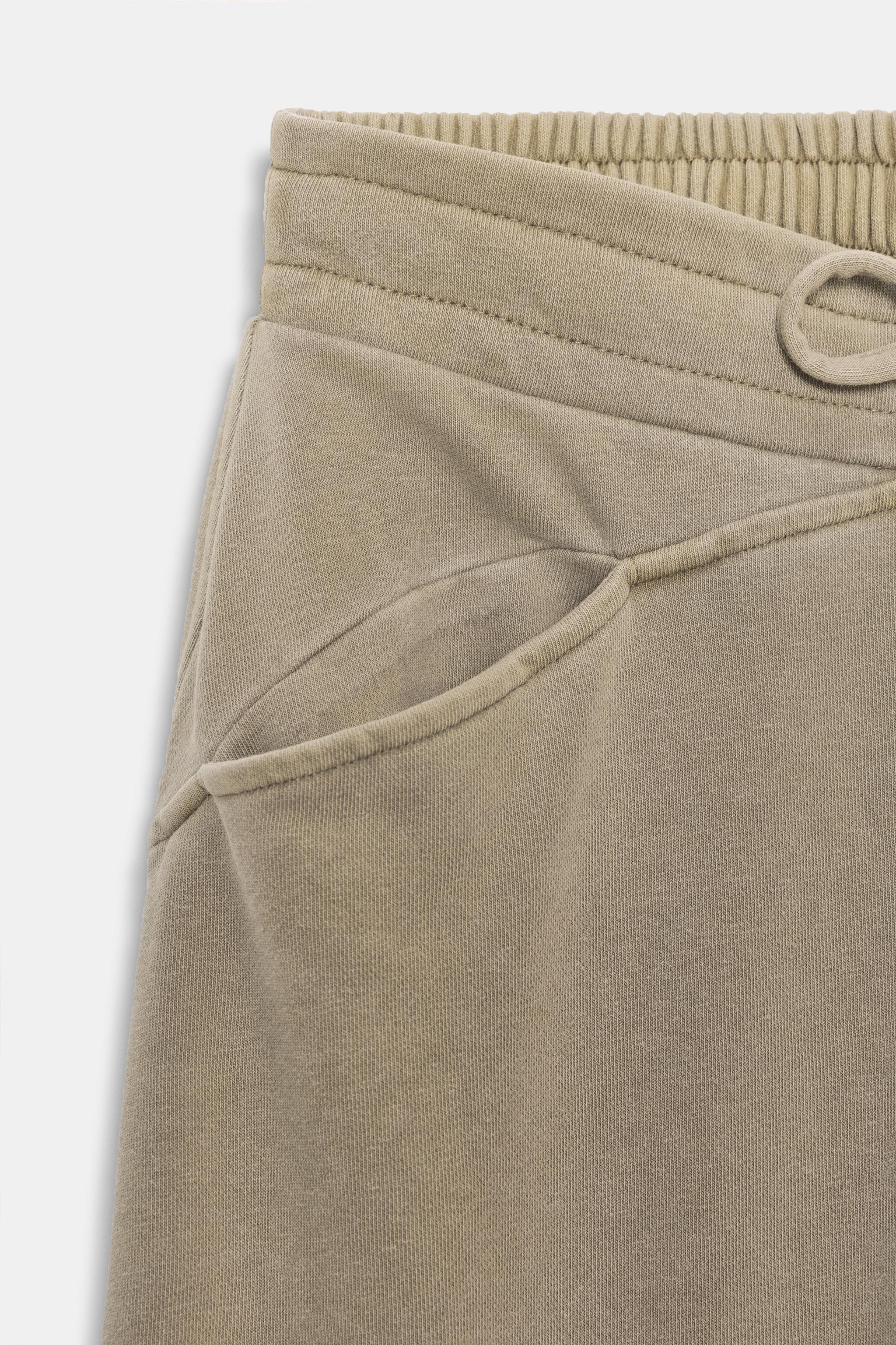 PANTALON EN MOLLETON EFFET DÉLAVÉ